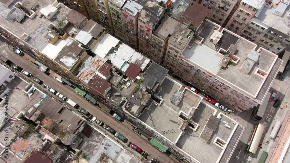 Hong Kong rundown slum houses, populated by work immigrant squatters, Top down aerial view. Hong Kong rundown slum houses, populated by work immigrant squatters, Top down aerial view.