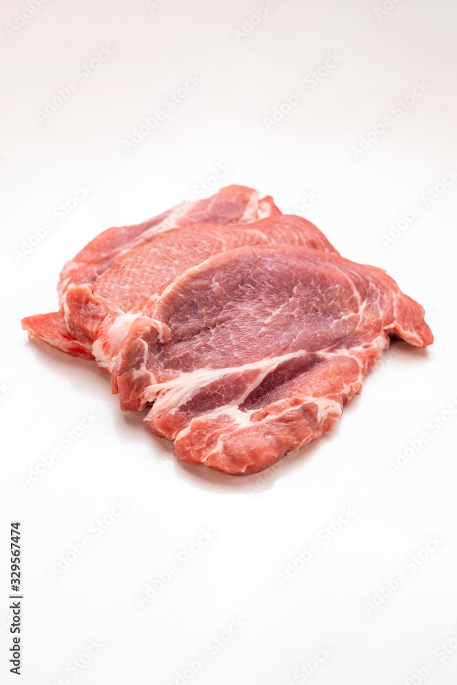 piece of raw meat, pork neck on white background.