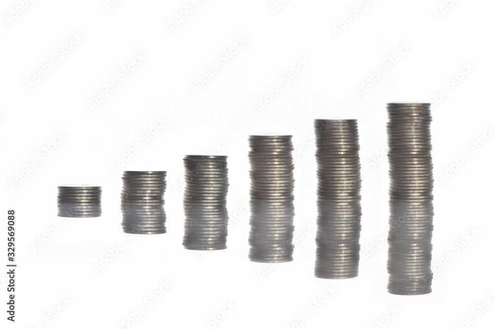 Stack of coins with reflection on white background, business success concept and growth idea Stack of coins with reflection on white background, business success concept and growth idea