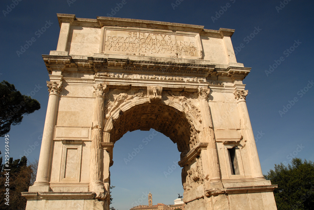 Arch of Titus, triumphal arch in Roman Forum, Rome, Italy  