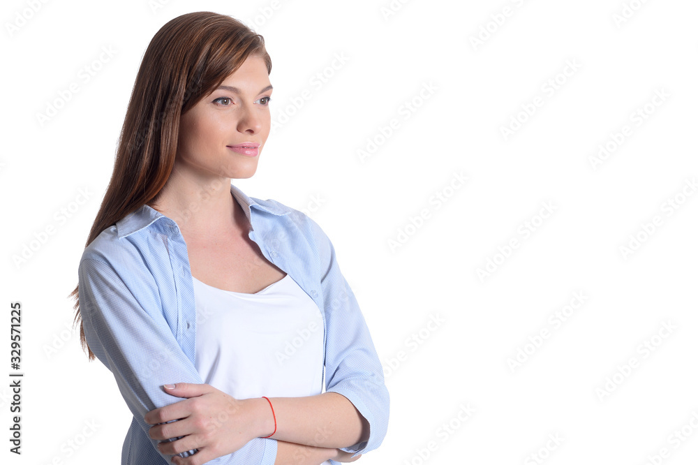 Beautiful smiling young woman posing isolated on white Beautiful smiling young woman posing isolated on white