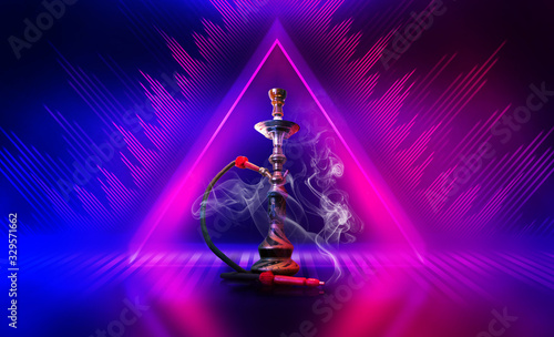 Hookah with smoke on a dark abstract background. Background of p