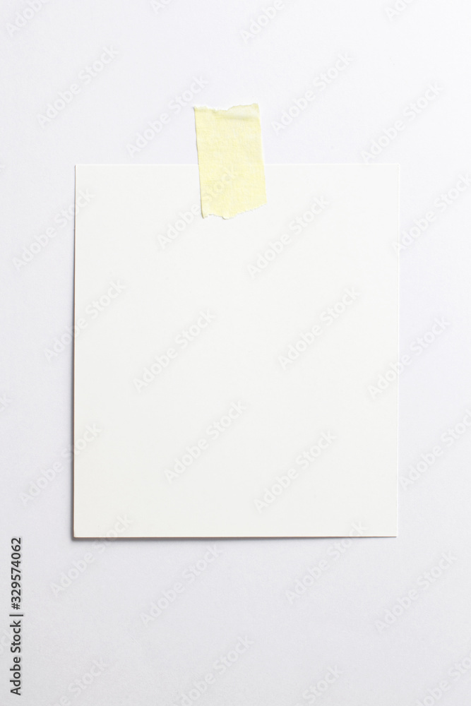 Blank polaroid photo frame with soft shadows and yellow scotch tape isolated on white paper background as template for graphic designers presentations, portfolios etc. Blank polaroid photo frame with soft shadows and yellow scotch tape isolated on white paper background as template for graphic designers presentations, portfolios etc.