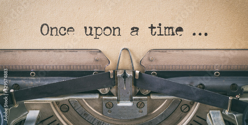 Text written with a vintage typewriter -  once upon a time photo