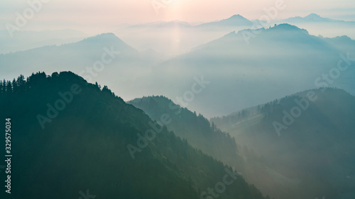 The morning sunlight shining from clouds with fog