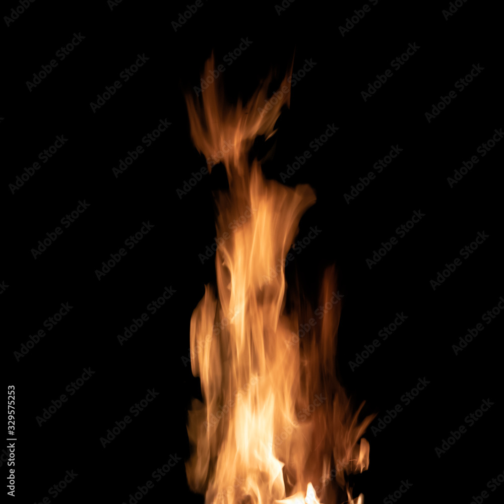 Bright bonfire flame isolated on black background
