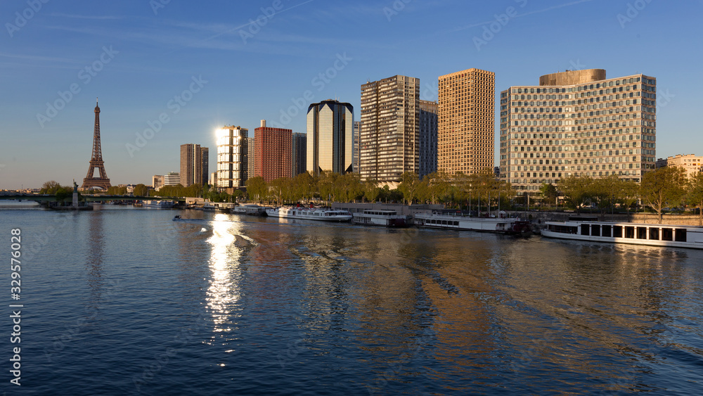 View on Eiffel Tower and Grenelle District across the river Seine in Paris, France