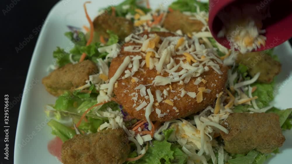 Shredded Cheese Added onto Chicken Salad Shredded Cheese Added onto Chicken Salad