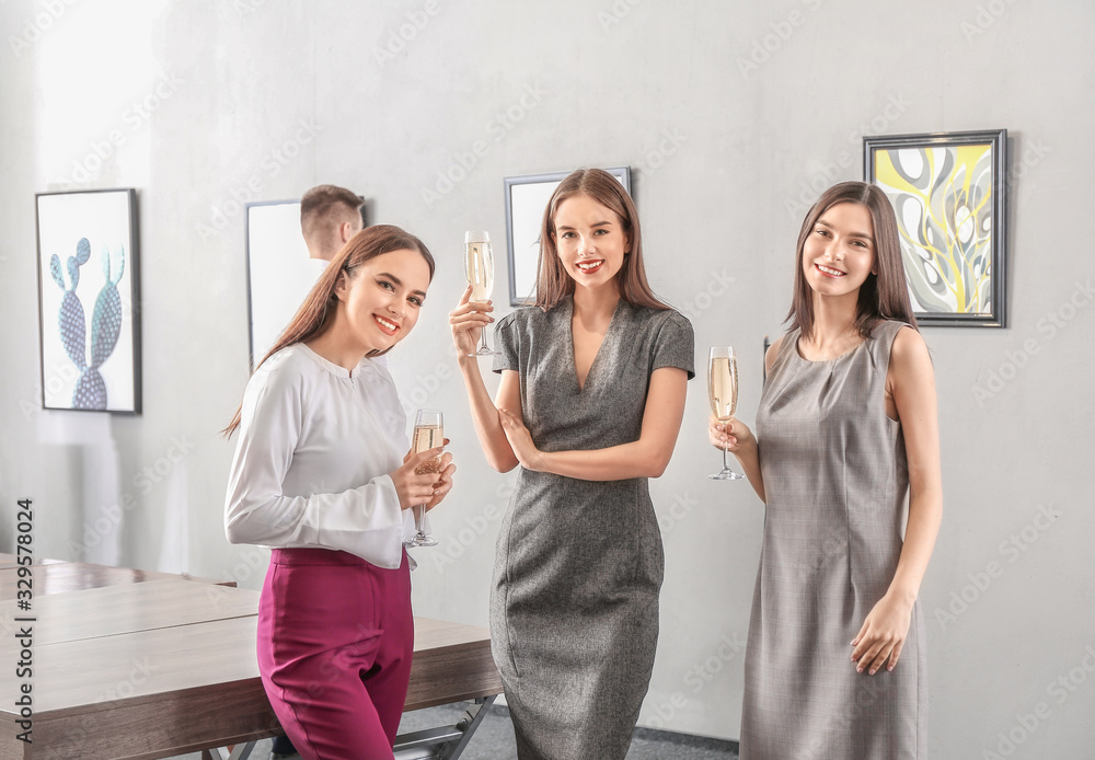 Naklejka premium People at exhibition in modern art gallery