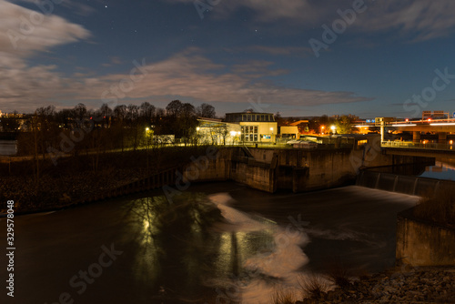 Hydroelectric power plant on the river Danube in Regensburg, Bavaria during cloudy night with stars © Robert Ruidl