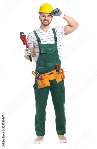 Handsome male worker on whi...