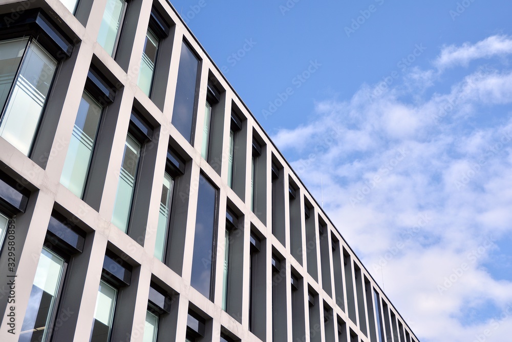 Modern office building facade abstract fragment, shiny windows in steel structure Modern office building facade abstract fragment, shiny windows in steel structure