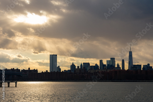 Lower Manhattan Skyline on the East River in New York City during Sunset
