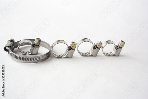 Steel worm clamp on a white background