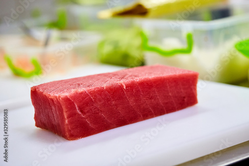 Steak of Tuna Fish Fillet on a cutting board - Fish and Seafood