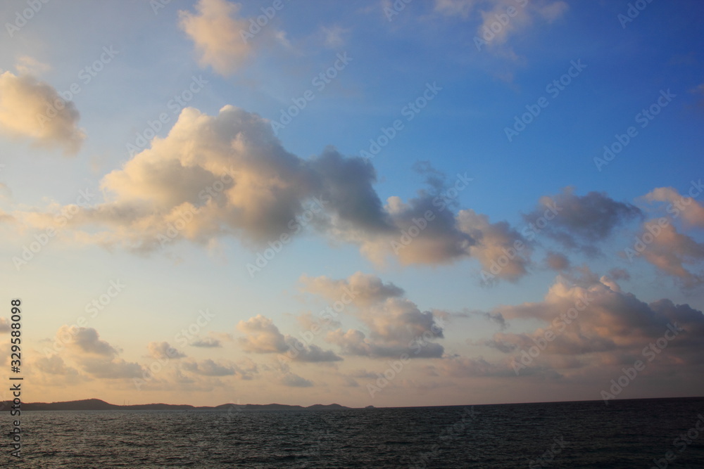 Clouds and morning sky on the sea.white clouds over the tropical sea at sunset.