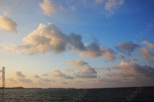 Clouds and morning sky on the sea.white clouds over the tropical sea at sunset.