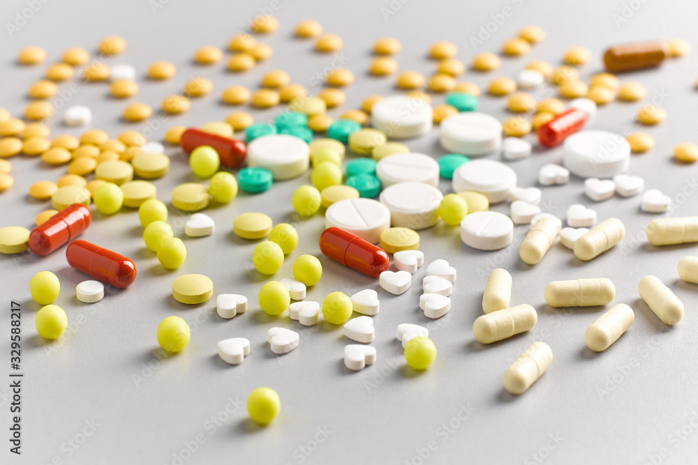 Closeup of many colored pills and bullets Closeup of many colored pills and bullets