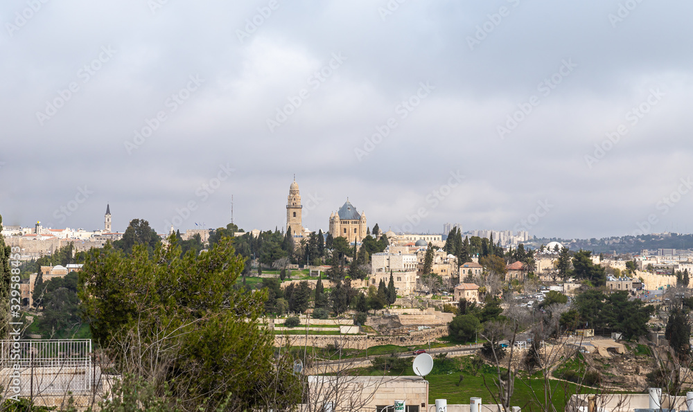 View of the old city of Jerusalem and the Dormition Abbey from the Abu Tor district of Jerusalem city in Israel