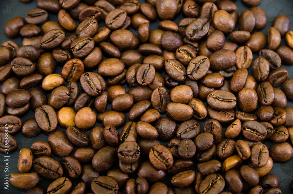 coffee beans on a black background. Background with grains. coffee beans on a black background. Background with grains.