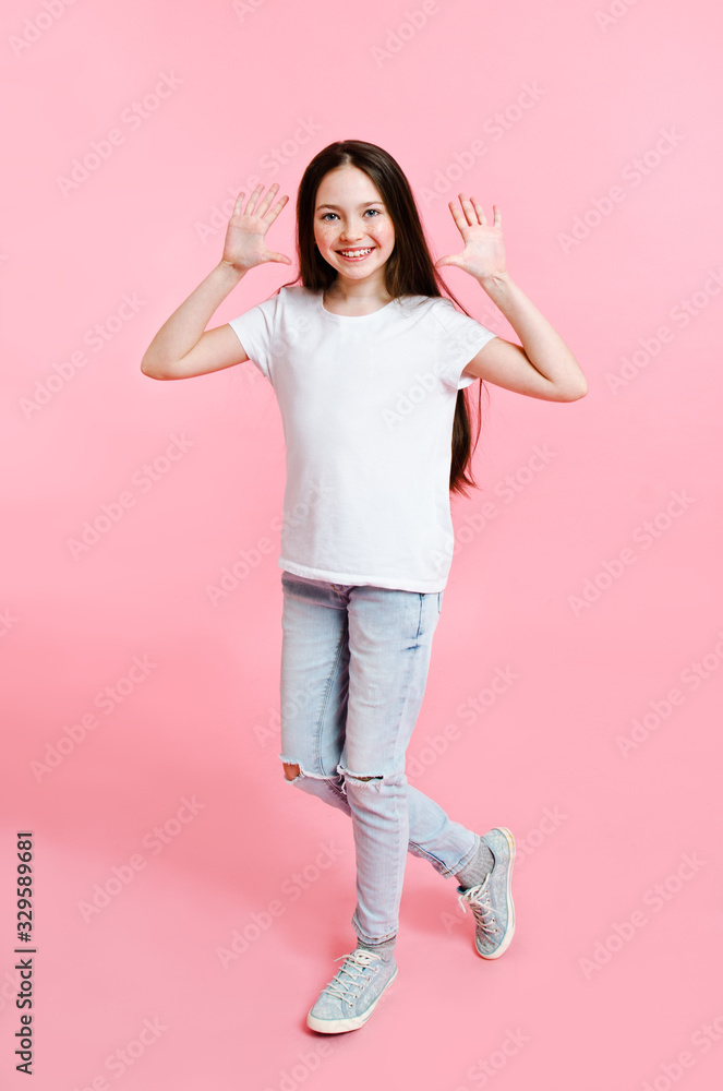 Portrait of adorable smiling little girl child in the white t-shirt isolated Portrait of adorable smiling little girl child in the white t-shirt isolated