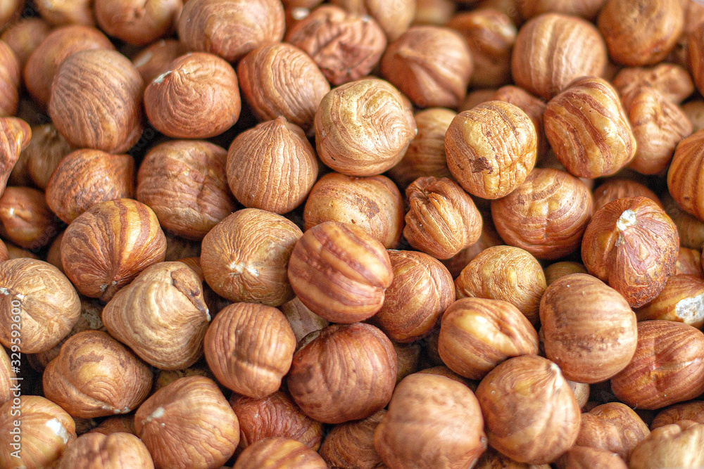 Background image of a pile of hazelnuts Background image of a pile of hazelnuts