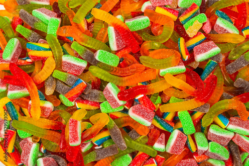 Assorted gummy candies. Top view. Jelly sweets background.