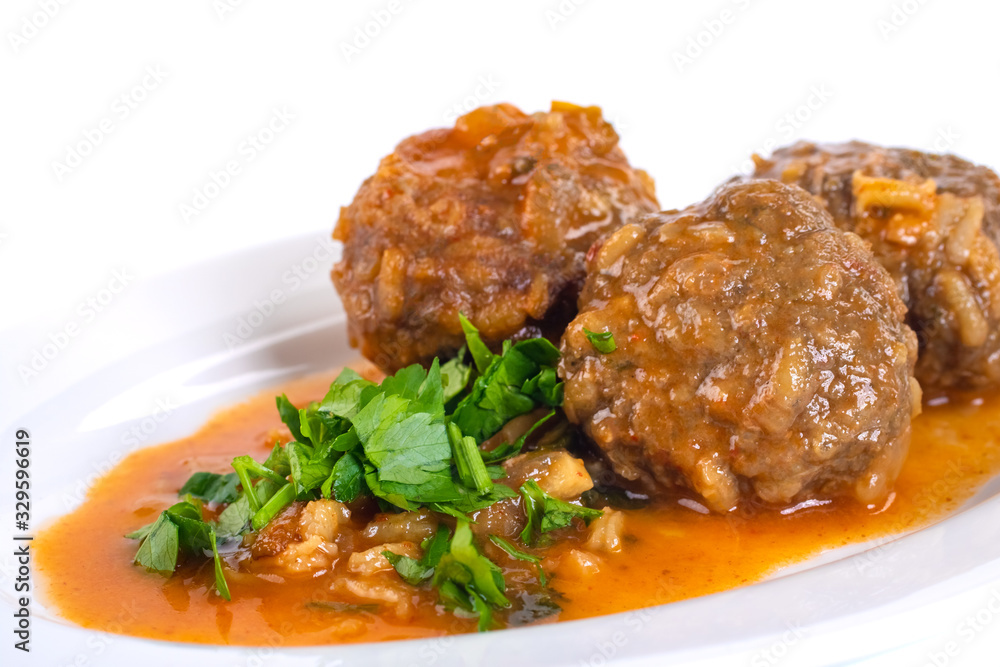 Delicious Swedish meatballs with a hearty brown sauce with parsley Delicious Swedish meatballs with a hearty brown sauce with parsley