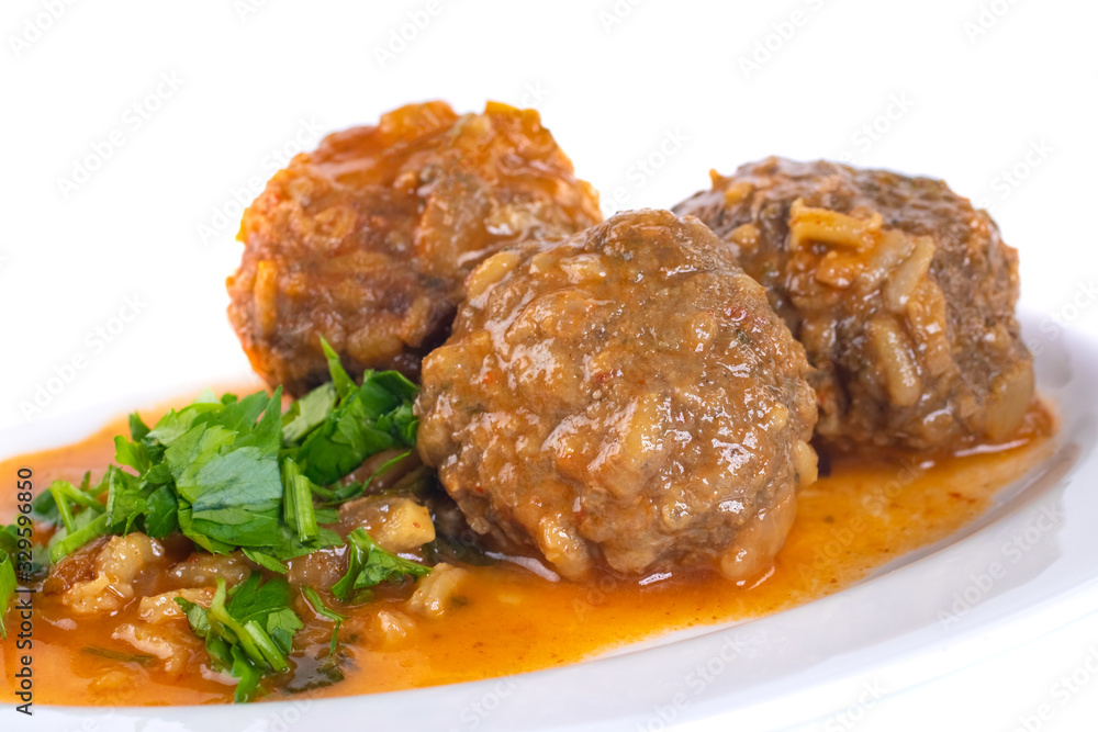 Delicious Swedish meatballs with a hearty brown sauce with parsley Delicious Swedish meatballs with a hearty brown sauce with parsley