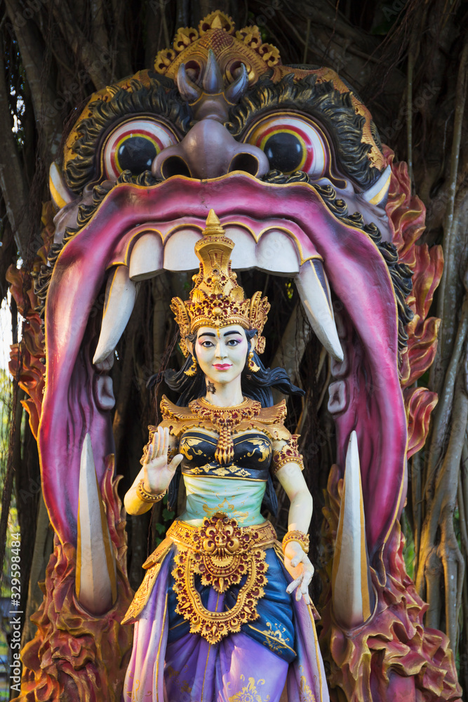 Woman statue with scary monster from Balinese mythology
