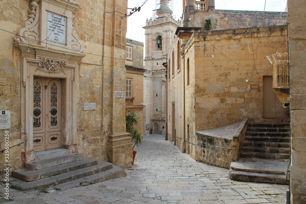 stone houses and st joseph oratory in vittoriosa (malta)