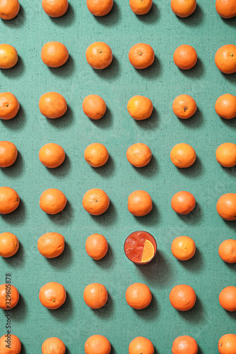 Garibaldi Cocktail with Oranges on Teal/Turquoise Background (Flat Lay)