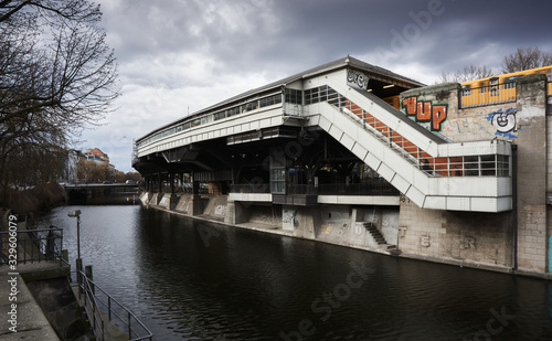 U-Bahn station Berlin near the river Underground metro station with a yellow train
