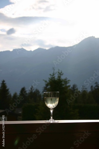 Glass of Wine on a Mountain View for Vacation Celebration