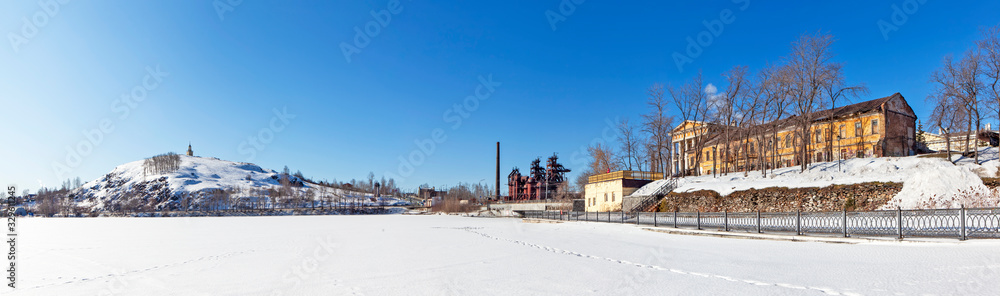 Panorama. Fox Mountain with a tower and the building of the former Demidov plant management. Manager's house and outbuilding. Nizhny Tagil. Russia