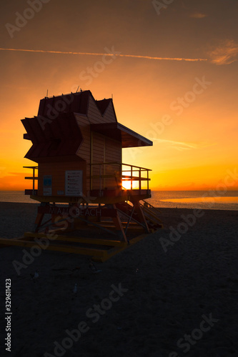 Iconic Miami Beach hut during sunrise with powerful clouds on a calm summer morning in Miami Beach (Miami, Florida, USA)