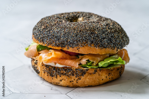 Salmon Bagel Sandwich with Lox Cream Cheese and Poppy Seeds photo