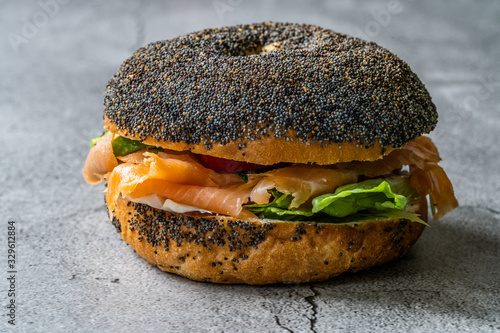 Salmon Bagel Sandwich with Lox Cream Cheese and Poppy Seeds photo