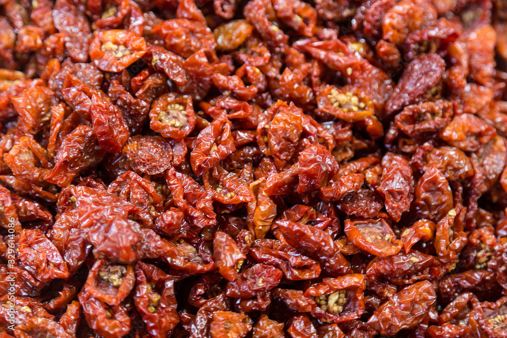dried cherry tomatoes on the counter at the market dried cherry tomatoes on the counter at the market