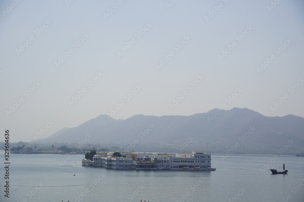 View of Taj Lake Palace Hotel on lake Pichola. : Udaipur Rajasthan - March 2020 View of Taj Lake Palace Hotel on lake Pichola. : Udaipur Rajasthan - March 2020