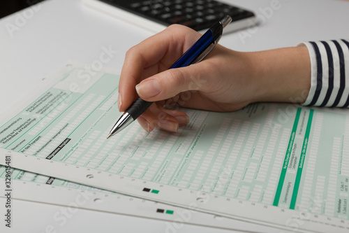 close up of filing a tax declaration with a pen