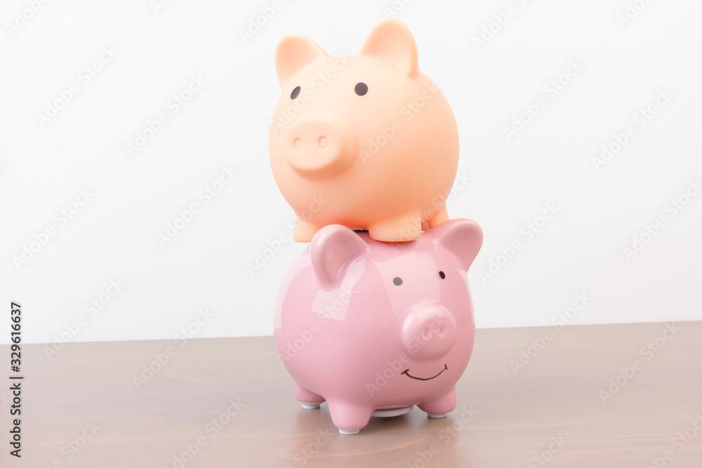 Piggy bank on wooden background, space for text. Finance, saving money Piggy bank on wooden background, space for text. Finance, saving money