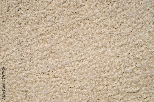 Rough limestone on wall closeup
