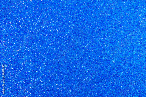 Abstract classic blue blurred background. Glitter festive backdrop.