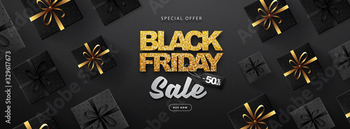 Black friday sale banner with gift boxes on dark black background