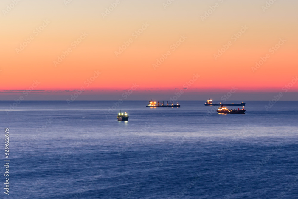 Picturesque sunrise on the Mediterranean sea, Tarragona, Spain