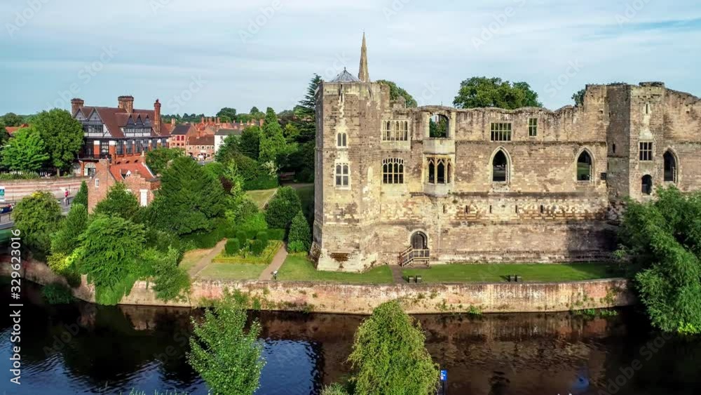 Ruins of medieval Gothic castle in Newark-on-Trent, near Nottingham, Nottinghamshire, England, UK. Aerial 4K video with Trent River in sunset light Ruins of medieval Gothic castle in Newark-on-Trent, near Nottingham, Nottinghamshire, England, UK. Aerial 4K video with Trent River in sunset light