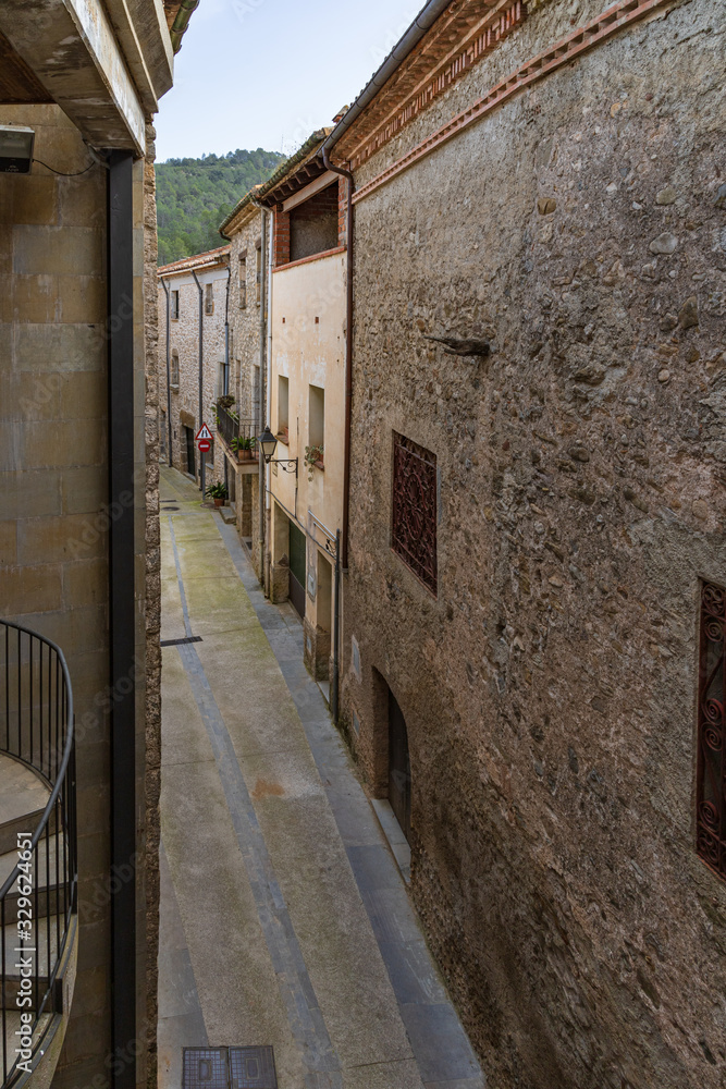 View of one of the alleys of the historic center of St Llorenzo of La Muga.