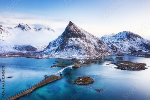 View from the air on the bridge and mountains during sunset. Lofoten Islands,...