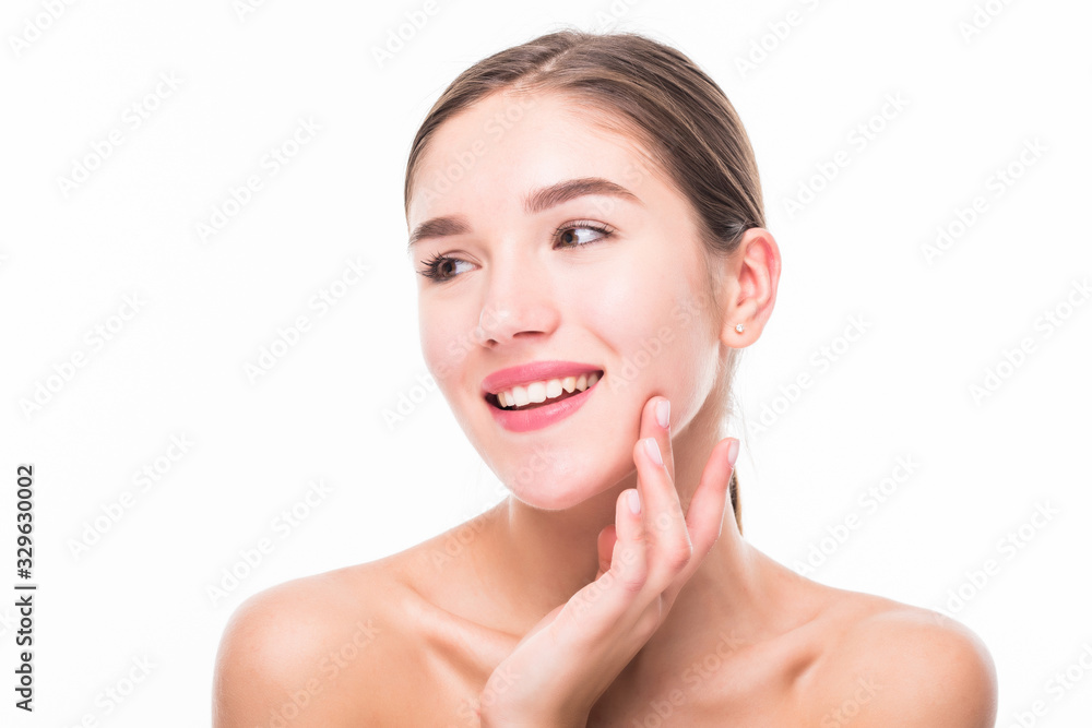 Portrait of happy smiling young woman touching skin or applying cream, isolated over white background Portrait of happy smiling young woman touching skin or applying cream, isolated over white background